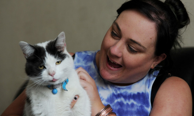 Home and safe: Hamish with Kerri after his ordeal.