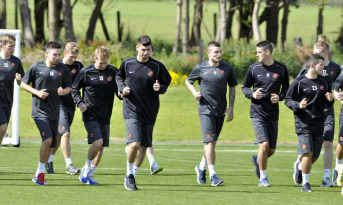 Trialist Nadir Ciftci (centre) training with the rest of the Dundee United squad.