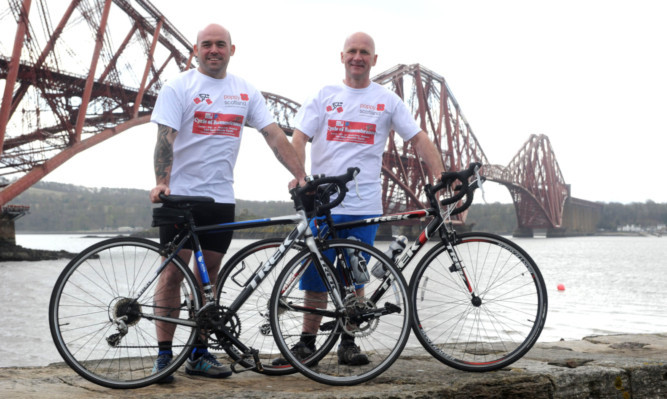 Thomas Bremner, left, and Sandy Cunningham next to the Forth Bridge.