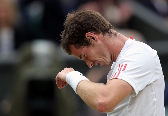 Great Britain's Andy Murray during his match against Switzerland's Roger Federer during day thirteen of the 2012 Wimbledon Championships at the All England Lawn Tennis Club, Wimbledon.
