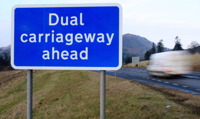 Kris Miller, Courier, 31/01/12. Picture today shows Dual carriageway ahead sign near Pitlochry for story about dualling of A9.