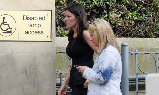 Charlene Buist (left)  heading to court in Dundee.