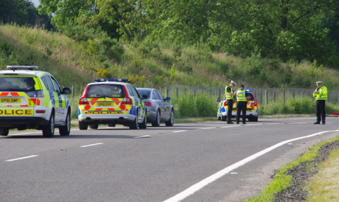 Police at the scene of the accident on Saturday.