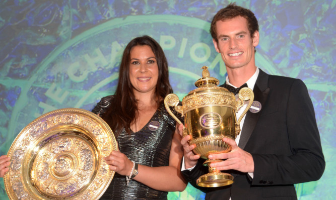 Marion Bartoli with Andy Murray at Sunday night's champions' dinner.