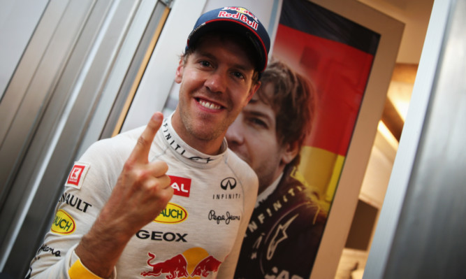 Vettel celebrates his win.