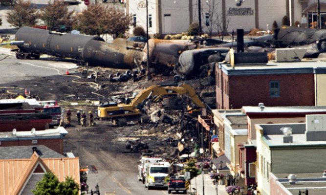 Searchers dig through the rubble for victims.