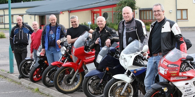 Kris Miller, Courier, 20/06/11. Picture today at Academy Street, Forfar shows the group of 7 friends who are travelling to Greece on £300 motorcycles. Pic shows L/R, Fred Heenan, Gordon Alexander, Jim Morrison, Colin Ritchie, Gordon Phillip, Graeme Phillip and Kim Cessford