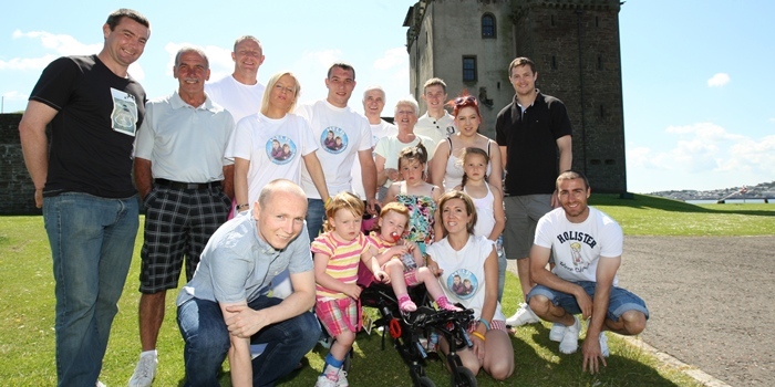 Kris Miller, Courier, 03/07/11. Picture today at Broughty Ferry where a charity walk was held to raise funds for the care of Ayley and Chloe. Pic shows some well known faces who turned out to take part in the charity walk with current Dundee and Dundee United players as well as Jocky Scott (Ex Dundee). Pic shows players etc with the twins and their family.