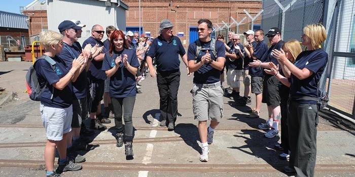 Kate and Jamie leishman lead Jim through the walkers as they reach the end of the dander