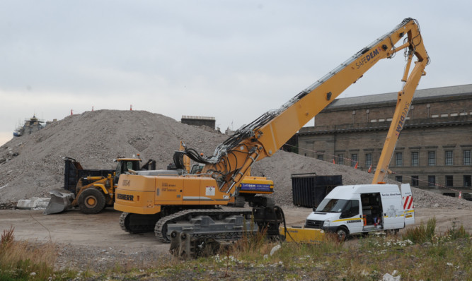 A mound of rubble is all that is left of Tayside House.