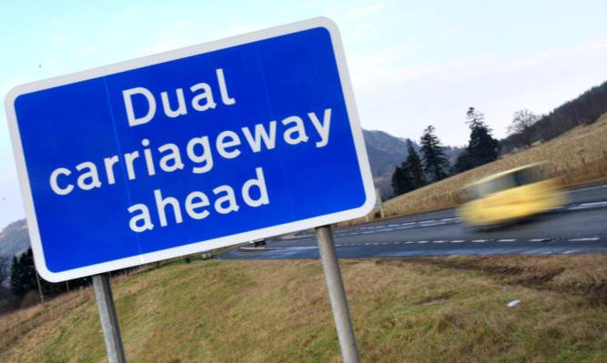 Kris Miller, Courier, 31/01/12. Picture today shows Dual carriageway ahead sign near Pitlochry for story about dualling of A9.