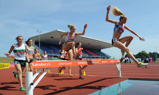 Eilish McColgan leads the way in the 3,000m steeplechase on day three in Birmingham.