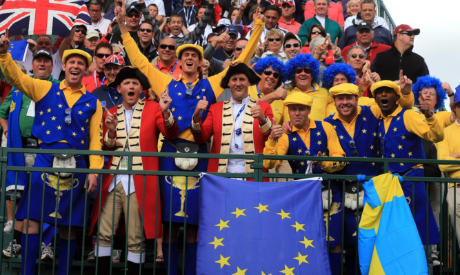 Organisers want to ensure real golf fans, like these at Medinah in 2012, have an equal chance to attend one of the sport's top occasions.