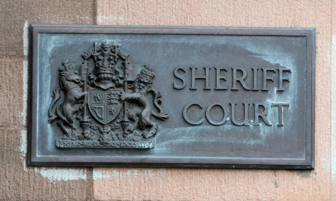 Kim Cessford - 03.05.12 - FOR FILE - pictured is the sign at Sheriff Court in Forfar