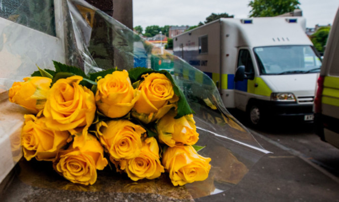 A floral tribute left outside the Elders Court block.