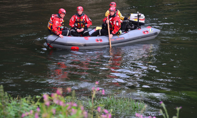 Rescue crews involved in the search on Tuesday.