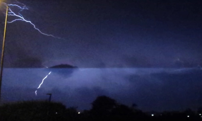 Courier reader David Robertson's photo of lightning seen from the Rock Gardens at Broughty Ferry.