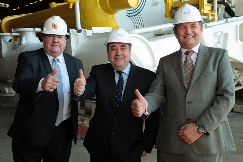 John Stevenson, Courier, 13/07/11. Fife.Methil. BiFab yard First Minister Alex Salmond  to unveil new Oyster 800 Wave Energy Device.Pic shows l/r  John robertson,Managing Director of Burntisland Fabrications,  Alex Salmond and Martin McAdam,Chief Executive of Aquamarine  at the launch ceremony.