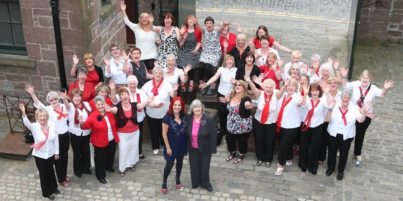 Steve MacDougall, Courier, Verdant Works, West Henderson's Wynd, Dundee. The BBC's 'One Show' filming on site. Pictured, Dundee Rep's women's singing group 'Loadsaweeminsinging' and at the front (left) is Presenter Carrie Grant and (right) local musician Sheena Wellington.