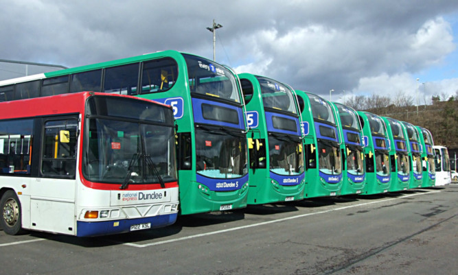 Hybrid-electic double decker buses at National Express Dundee.