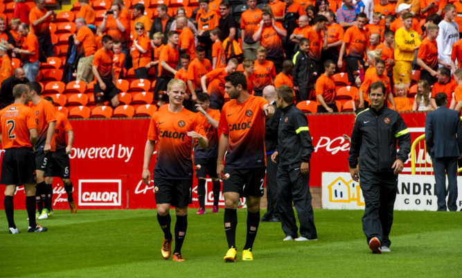 New Dundee United signing Nadir Ciftci (right) chats with Gary Mackay-Steven.