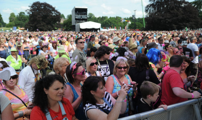 The crowd enjoying Howard Jones.