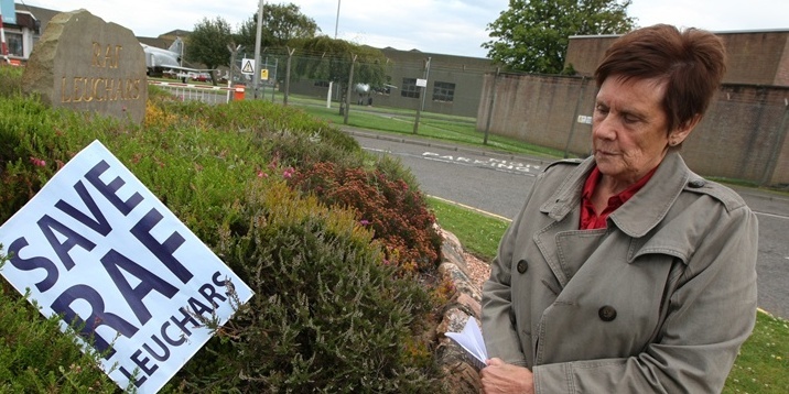 DOUGIE NICOLSON, COURIER, 18/07/11, NEWS. 

Carol Finnie - Chairman Leuchars Community Council & Vice Chair Resident Action Force, outside the main gate at RAF Leuchars today, Monday 18th July 2011.  Story by Aileen, Cupar office.