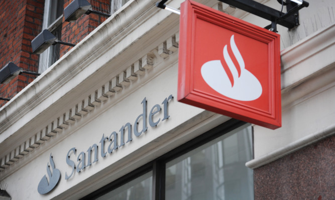 Stock photographs of a branch of the bank Santander in Victoria Street, London today. PRESS ASSOCIATION Photo. Picture date: Tuesday January 29, 2013. Photo credit should read: Stefan Rousseau/PA Wire