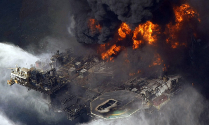 The blow-out of the Deepwater Horizon well off the Louisiana coast in 2010. BP said the rate of new compensation claims resulting from the disaster meant it would soon have to start paying them out of its profits.