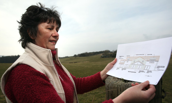 Moira Henderson at the site with the rejected plans.