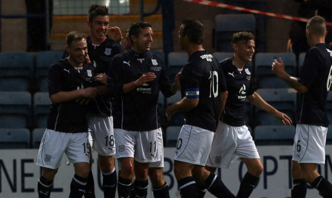Dundee's Declan Gallagher celebrates his goal against Rangers.