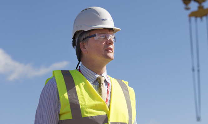 Scottish Secretary Michael Moore visits the partially-complete HMS Queen Elizabeth aircraft carrier in Rosyth Dockyard.