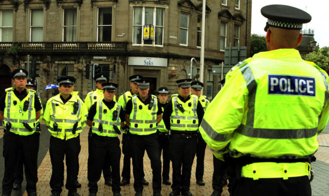 Police officers at the early morning briefing by Inspector Stevie Foggin ahead of Operation LABO