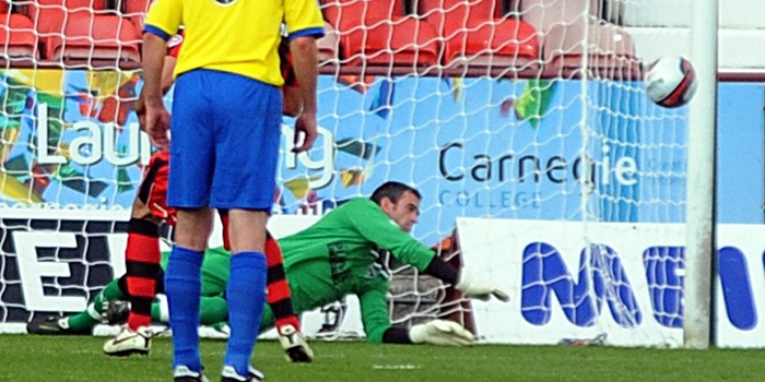 Paul Gallacher saves the penalty