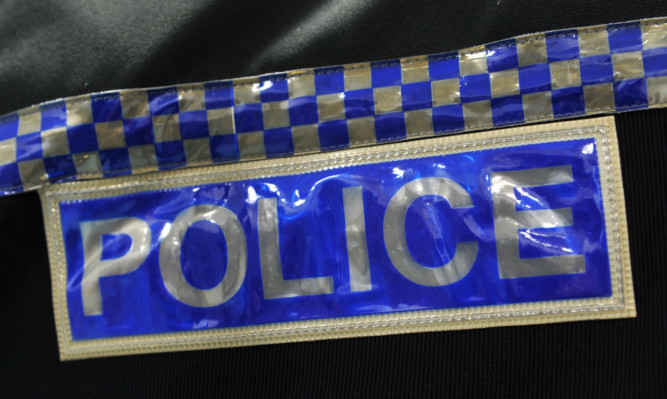 Kim Cessford - 12.04.12 - FOR FILE - pictured is Police logo on kevlar jacket in the equipment room in the new police station at Brunton House, Cowdenbeath