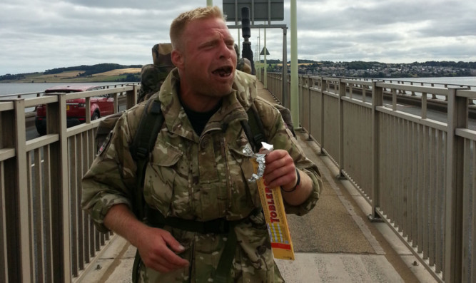 Christian Nock arrives in Dundee muching a Toblerone in tribute to Alan Partridge.
