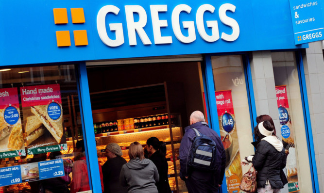 Greggs issued a profits warning, but a new strategy with greater focus was welcomed by analysts.