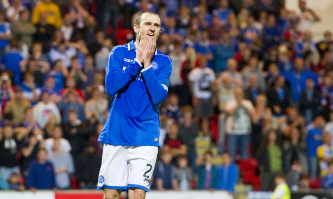 St Johnstone captain Dave Mackay dejected after penalty miss.