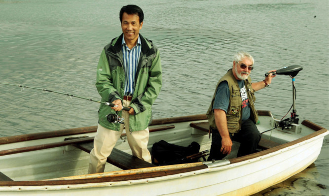 Mr Li Ruiyou with Angus Council leader Iain Gaul at Piperdam.