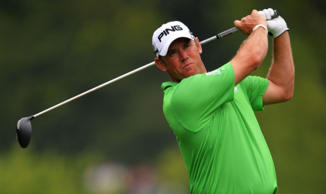 Lee Westwood tees off on the ninth as he bids for his first major.