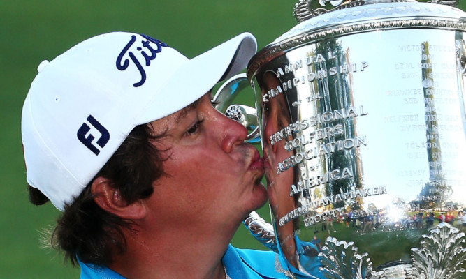 Jason Dufner with the winner's trophy.