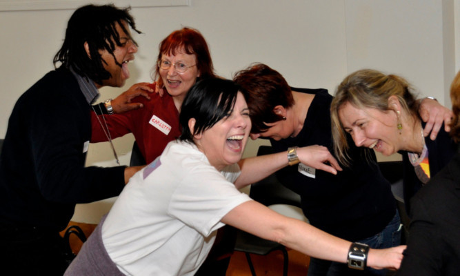 Joyworks laughter yoga sessions, which will be coming to Dundee this Saturday.