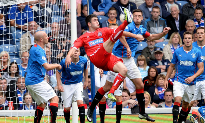 Steven Jackson pulls a goal back for Brechin with a spectacular overhead kick.