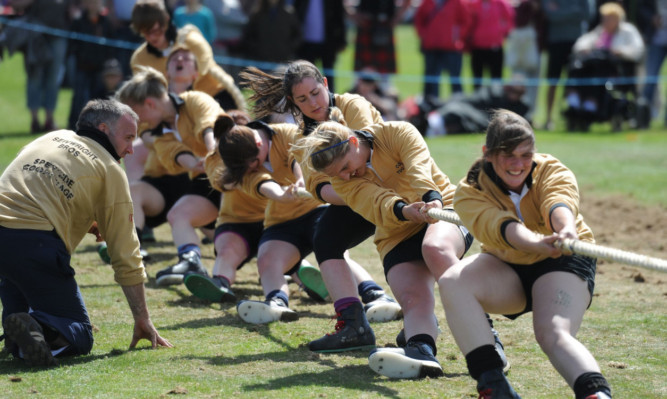 Cornhill Ladies competing in the tug of war.