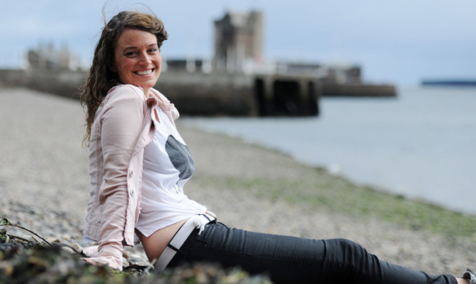 Anna takes time out at Broughty Ferry beach.