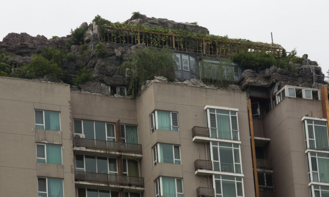 The rooftop villa faces demolition.