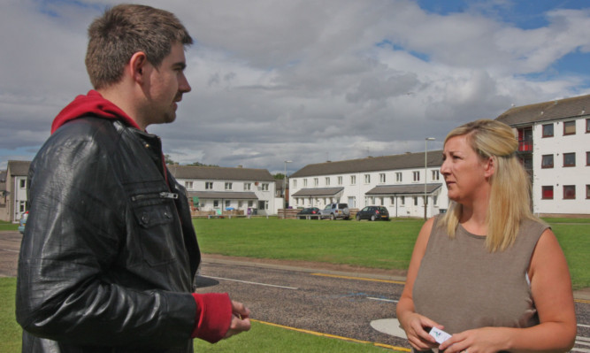 Councillor Martyn Geddes talks to JJ Christine about the vandalism.