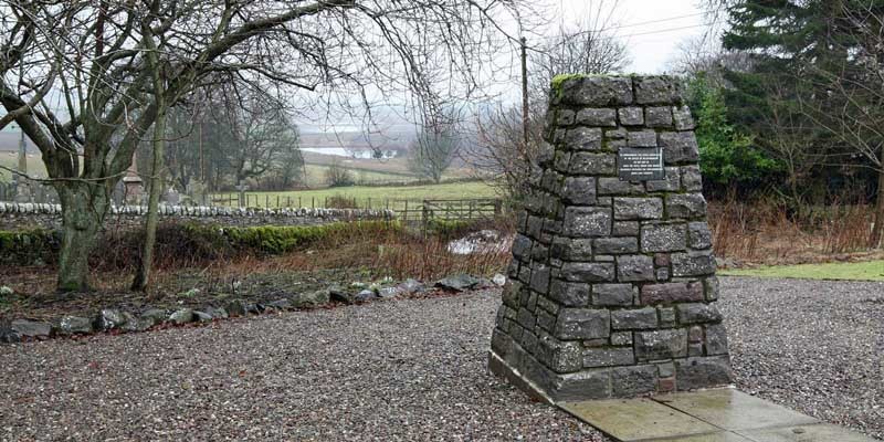 Kim Cessford, Courier - 19.02.11 -the memorial cairn with in the background view of Nechtansmere with pond and flooded fields - for words from Graham Brown