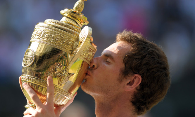 Andy Murray after defeating Serbias Novak Djokovic in the mens final at Wimbledon.