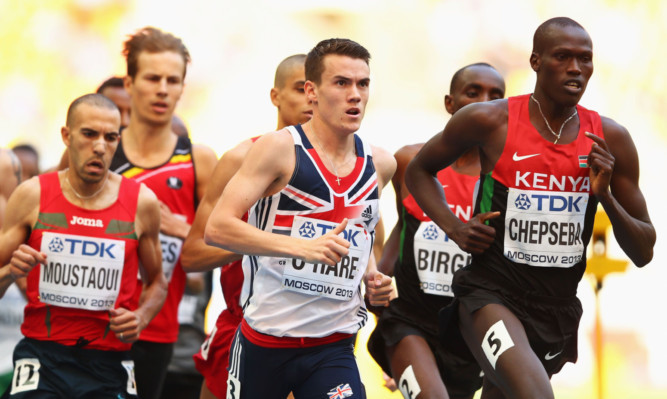 Chris OHare tracks Kenyas Nixon Chepseba during the mens 1,500 metres heat.